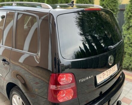 Чорний Фольксваген Туран, об'ємом двигуна 2 л та пробігом 205 тис. км за 7800 $, фото 8 на Automoto.ua