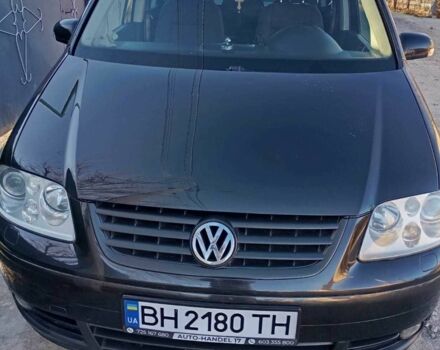 Черный Фольксваген Туран, объемом двигателя 2 л и пробегом 400 тыс. км за 6000 $, фото 1 на Automoto.ua