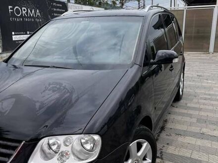Фольксваген Туран 2003 у Сваляве на Automoto.ua Чорний Фольксваген Туран, об'ємом двигуна 1.97 л та пробігом 277 тис. км за 4900 $, фото 1 на Automoto.ua
