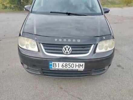 Фольксваген Туран 2003 у Полтаві на Automoto.ua Чорний Фольксваген Туран, об'ємом двигуна 2 л та пробігом 350 тис. км за 5500 $, фото 1 на Automoto.ua