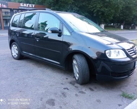 Черный Фольксваген Туран, объемом двигателя 1.6 л и пробегом 264 тыс. км за 6300 $, фото 1 на Automoto.ua