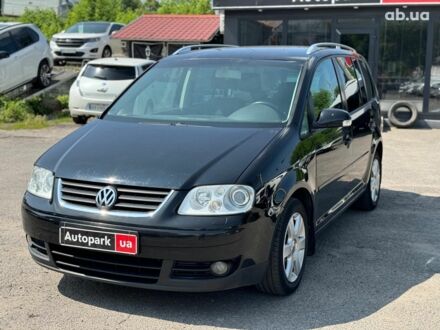 Фольксваген Туран 2003 у Вінниці на Automoto.ua Чорний Фольксваген Туран, об'ємом двигуна 1.6 л та пробігом 275 тис. км за 6090 $, фото 1 на Automoto.ua