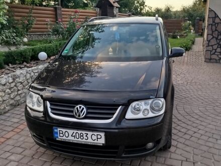 Черный Фольксваген Туран, объемом двигателя 1.6 л и пробегом 168 тыс. км за 5500 $, фото 1 на Automoto.ua