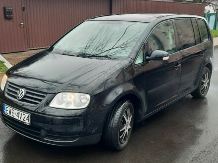 Черный Фольксваген Туран, объемом двигателя 1.9 л и пробегом 425 тыс. км за 2800 $, фото 1 на Automoto.ua