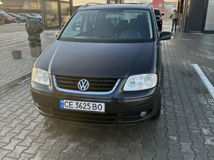 Чорний Фольксваген Туран, об'ємом двигуна 1.97 л та пробігом 388 тис. км за 4900 $, фото 1 на Automoto.ua