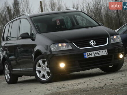 Чорний Фольксваген Туран, об'ємом двигуна 2 л та пробігом 267 тис. км за 5999 $, фото 1 на Automoto.ua