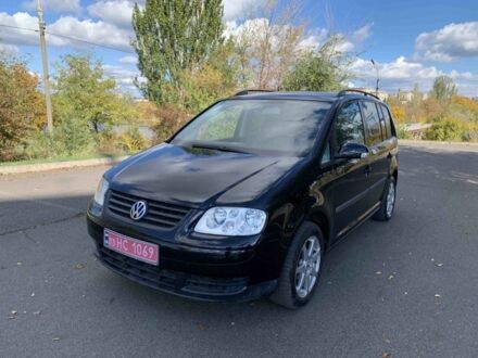 Фольксваген Туран 2004 в Кривом Роге на Automoto.ua Черный Фольксваген Туран, объемом двигателя 0 л и пробегом 244 тыс. км за 6450 $, фото 1 на Automoto.ua