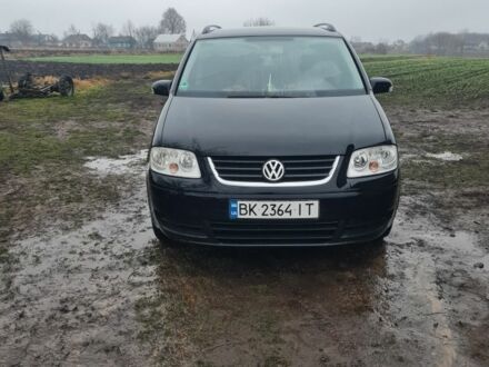 Чорний Фольксваген Туран, об'ємом двигуна 2 л та пробігом 278 тис. км за 6000 $, фото 1 на Automoto.ua