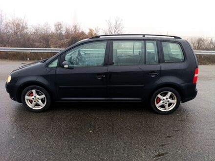 Чорний Фольксваген Туран, об'ємом двигуна 2 л та пробігом 35 тис. км за 3014 $, фото 1 на Automoto.ua