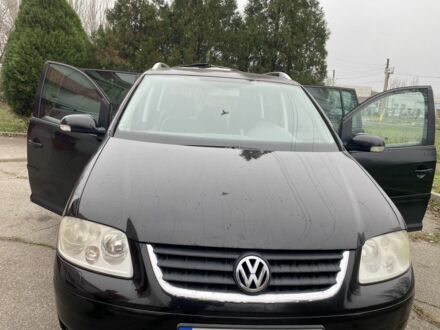 Чорний Фольксваген Туран, об'ємом двигуна 2 л та пробігом 383 тис. км за 3500 $, фото 1 на Automoto.ua