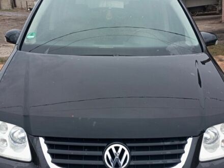 Чорний Фольксваген Туран, об'ємом двигуна 0 л та пробігом 260 тис. км за 7000 $, фото 1 на Automoto.ua