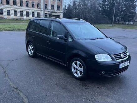 Чорний Фольксваген Туран, об'ємом двигуна 1.97 л та пробігом 293 тис. км за 5900 $, фото 1 на Automoto.ua