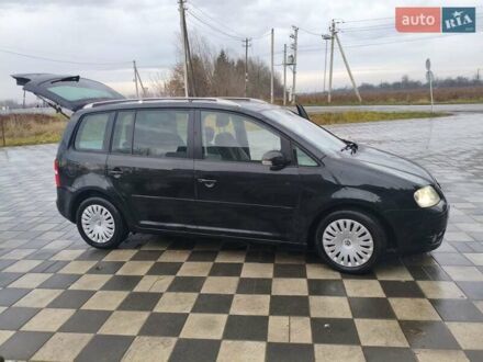 Чорний Фольксваген Туран, об'ємом двигуна 1.97 л та пробігом 262 тис. км за 6500 $, фото 1 на Automoto.ua