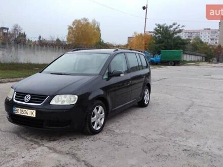 Чорний Фольксваген Туран, об'ємом двигуна 1.6 л та пробігом 249 тис. км за 5500 $, фото 1 на Automoto.ua