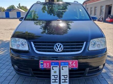 Фольксваген Туран 2004 у Каменце-Подольском на Automoto.ua Чорний Фольксваген Туран, об'ємом двигуна 1.6 л та пробігом 190 тис. км за 5500 $, фото 1 на Automoto.ua