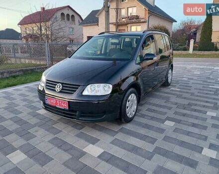 Черный Фольксваген Туран, объемом двигателя 0 л и пробегом 143 тыс. км за 5900 $, фото 1 на Automoto.ua