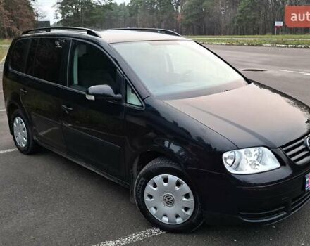 Черный Фольксваген Туран, объемом двигателя 1.6 л и пробегом 240 тыс. км за 5700 $, фото 1 на Automoto.ua