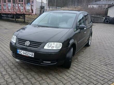 Чорний Фольксваген Туран, об'ємом двигуна 1.6 л та пробігом 293 тис. км за 4600 $, фото 1 на Automoto.ua