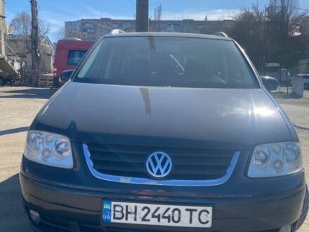 Чорний Фольксваген Туран, об'ємом двигуна 2 л та пробігом 3 тис. км за 5500 $, фото 1 на Automoto.ua