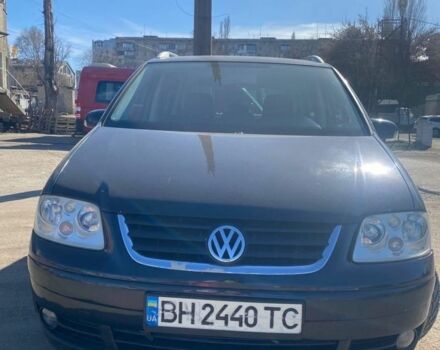 Чорний Фольксваген Туран, об'ємом двигуна 2 л та пробігом 3 тис. км за 5500 $, фото 1 на Automoto.ua