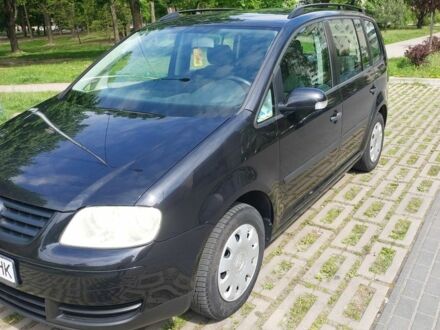Фольксваген Туран 2004 у Луцьку на Automoto.ua Чорний Фольксваген Туран, об'ємом двигуна 1.6 л та пробігом 278 тис. км за 5750 $, фото 1 на Automoto.ua