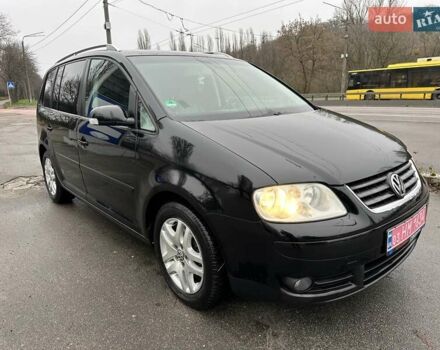 Черный Фольксваген Туран, объемом двигателя 1.6 л и пробегом 192 тыс. км за 5700 $, фото 1 на Automoto.ua