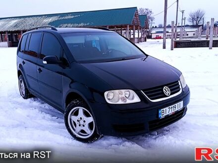 Черный Фольксваген Туран, объемом двигателя 1.6 л и пробегом 0 тыс. км за 4999 $, фото 1 на Automoto.ua