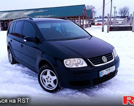 Черный Фольксваген Туран, объемом двигателя 1.6 л и пробегом 0 тыс. км за 4999 $, фото 1 на Automoto.ua