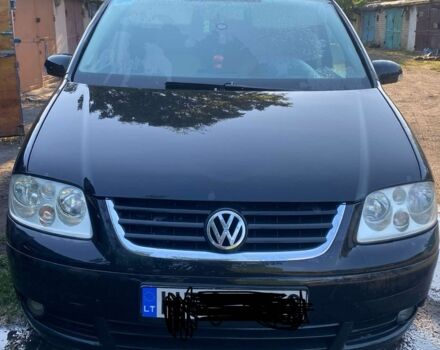 Чорний Фольксваген Туран, об'ємом двигуна 2 л та пробігом 310 тис. км за 3200 $, фото 1 на Automoto.ua