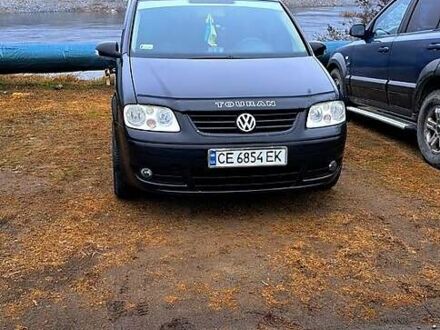 Черный Фольксваген Туран, объемом двигателя 1.9 л и пробегом 385 тыс. км за 5800 $, фото 1 на Automoto.ua