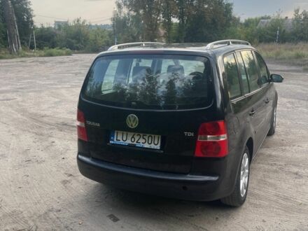 Чорний Фольксваген Туран, об'ємом двигуна 1.9 л та пробігом 223 тис. км за 3104 $, фото 1 на Automoto.ua