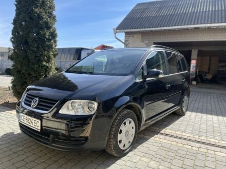 Фольксваген Туран 2005 в Черновцах на Automoto.ua Черный Фольксваген Туран, объемом двигателя 1.9 л и пробегом 265 тыс. км за 6961 $, фото 1 на Automoto.ua