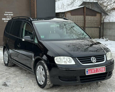 Чорний Фольксваген Туран, об'ємом двигуна 1.6 л та пробігом 169 тис. км за 6199 $, фото 1 на Automoto.ua