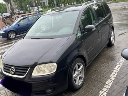 Фольксваген Туран 2005 в Каменце-Подольском на Automoto.ua Черный Фольксваген Туран, объемом двигателя 0 л и пробегом 244 тыс. км за 6000 $, фото 1 на Automoto.ua