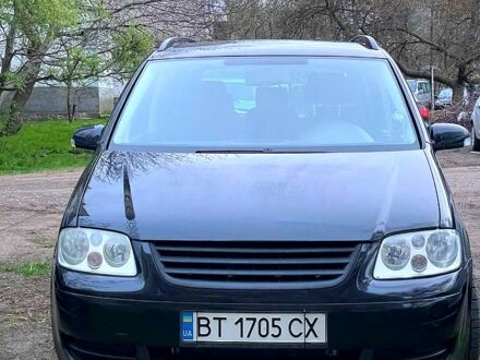Фольксваген Туран 2005 в Николаеве на Automoto.ua Черный Фольксваген Туран, объемом двигателя 2 л и пробегом 243 тыс. км за 6500 $, фото 1 на Automoto.ua