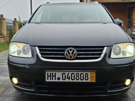 Черный Фольксваген Туран, объемом двигателя 2 л и пробегом 272 тыс. км за 3100 $, фото 1 на Automoto.ua