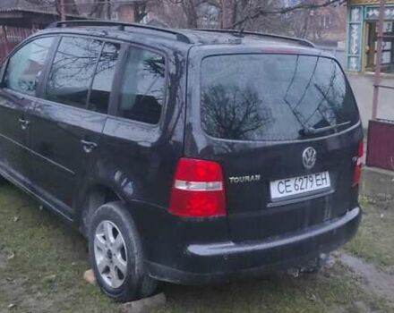 Черный Фольксваген Туран, объемом двигателя 1.98 л и пробегом 295 тыс. км за 3500 $, фото 1 на Automoto.ua
