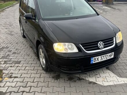 Фольксваген Туран 2005 в Хмельницком на Automoto.ua Черный Фольксваген Туран, объемом двигателя 1.6 л и пробегом 290 тыс. км за 4600 $, фото 1 на Automoto.ua