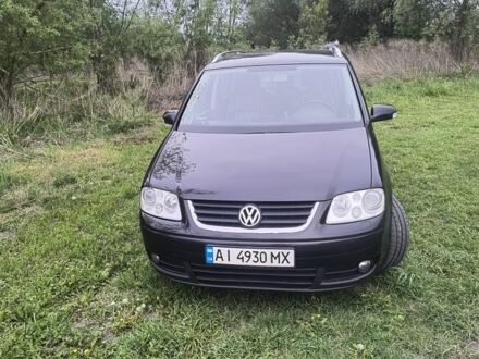 Фольксваген Туран 2005 в Броварах на Automoto.ua Черный Фольксваген Туран, объемом двигателя 2 л и пробегом 339 тыс. км за 5300 $, фото 1 на Automoto.ua