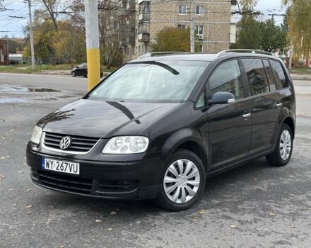 Фольксваген Туран 2005 в Харькове на Automoto.ua Черный Фольксваген Туран, объемом двигателя 0 л и пробегом 123 тыс. км за 2700 $, фото 1 на Automoto.ua