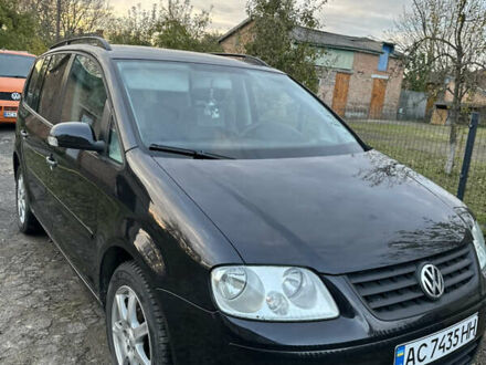 Чорний Фольксваген Туран, об'ємом двигуна 1.6 л та пробігом 295 тис. км за 5700 $, фото 1 на Automoto.ua