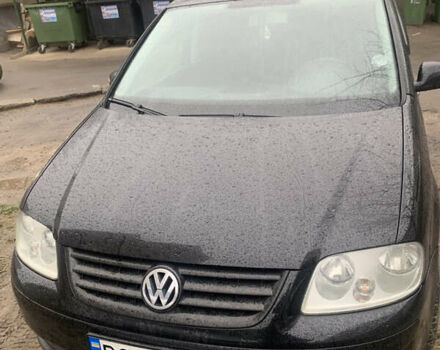 Черный Фольксваген Туран, объемом двигателя 1.9 л и пробегом 358 тыс. км за 5500 $, фото 1 на Automoto.ua
