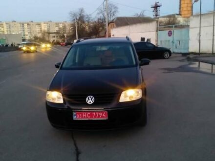 Фольксваген Туран 2005 в Белой Церкве на Automoto.ua Черный Фольксваген Туран, объемом двигателя 1.6 л и пробегом 210 тыс. км за 5850 $, фото 1 на Automoto.ua