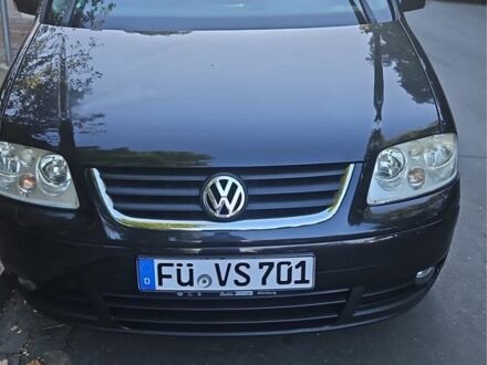 Черный Фольксваген Туран, объемом двигателя 0 л и пробегом 230 тыс. км за 3799 $, фото 1 на Automoto.ua