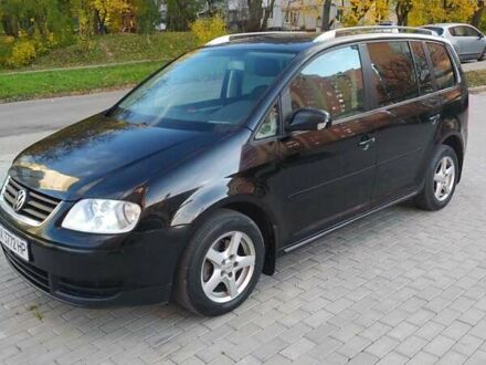 Фольксваген Туран 2005 в Хмельницком на Automoto.ua Черный Фольксваген Туран, объемом двигателя 1.6 л и пробегом 283 тыс. км за 5200 $, фото 1 на Automoto.ua