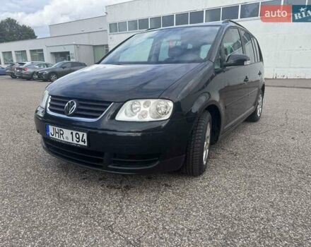 Фольксваген Туран 2005 в Житомире на Automoto.ua Черный Фольксваген Туран, объемом двигателя 1.6 л и пробегом 186 тыс. км за 6950 $, фото 1 на Automoto.ua