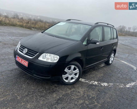 Черный Фольксваген Туран, объемом двигателя 1.6 л и пробегом 198 тыс. км за 6800 $, фото 1 на Automoto.ua