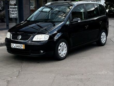 Черный Фольксваген Туран, объемом двигателя 1.6 л и пробегом 190 тыс. км за 6800 $, фото 1 на Automoto.ua