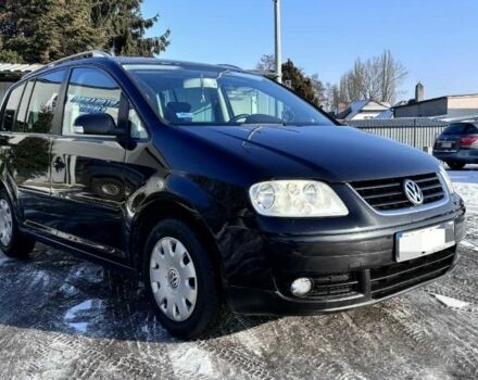 Черный Фольксваген Туран, объемом двигателя 2 л и пробегом 280 тыс. км за 5500 $, фото 1 на Automoto.ua