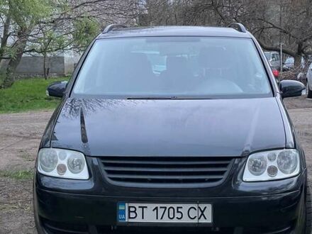 Фольксваген Туран 2005 в Николаеве на Automoto.ua Черный Фольксваген Туран, объемом двигателя 1.97 л и пробегом 243 тыс. км за 6400 $, фото 1 на Automoto.ua